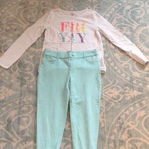 Place long sleeve shirt and blue sparkly pants